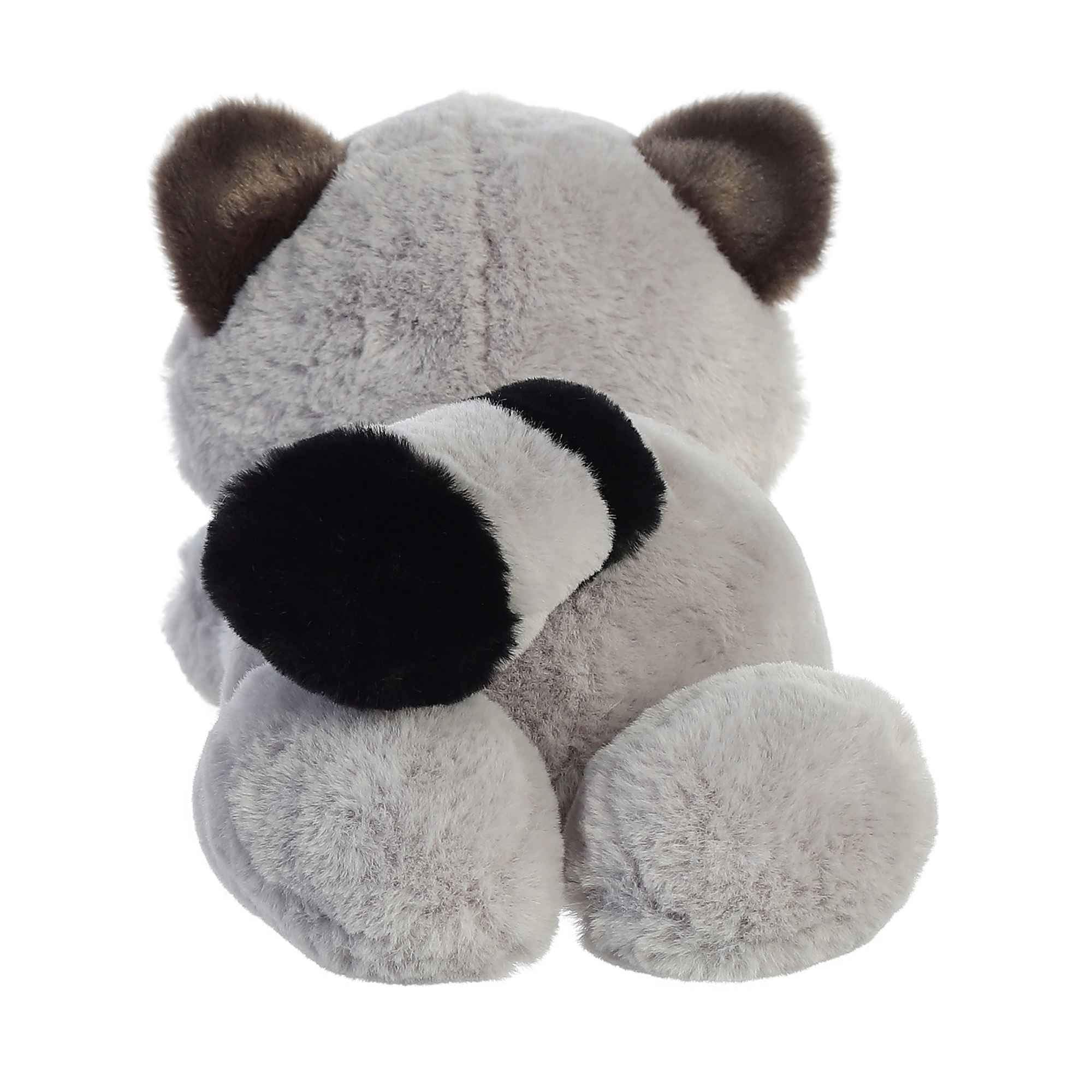 Aurora Roy Raccoon Flopsie on shelf adds cheerful decor.