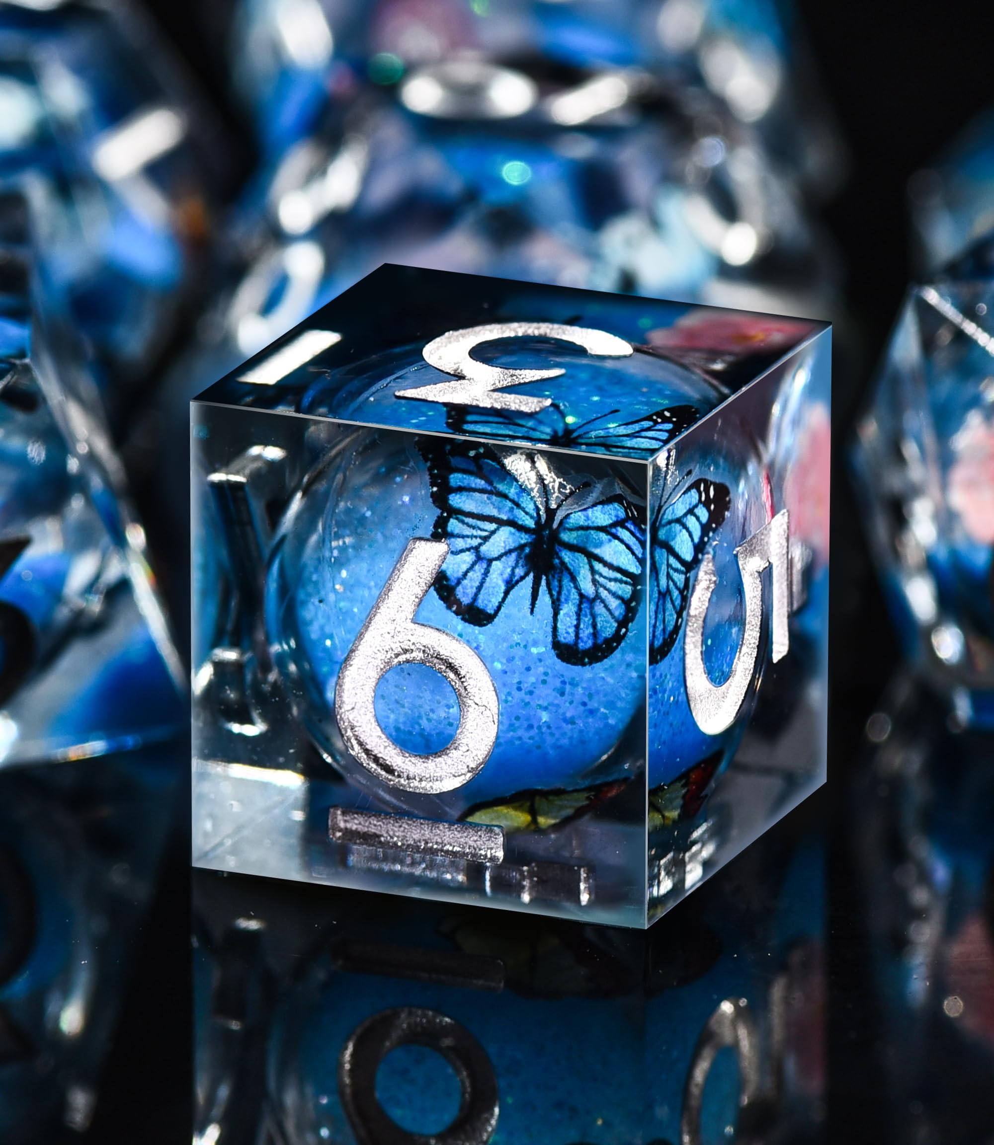 AUSTOR butterfly dice with sharp polished edges, delivering a gem-like look and precise rolling feel.