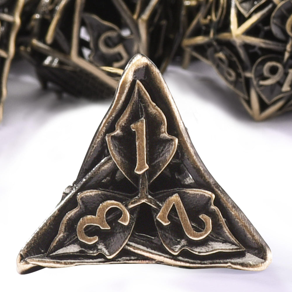 AUSTOR hollow-carved copper dice with maple leaf details.