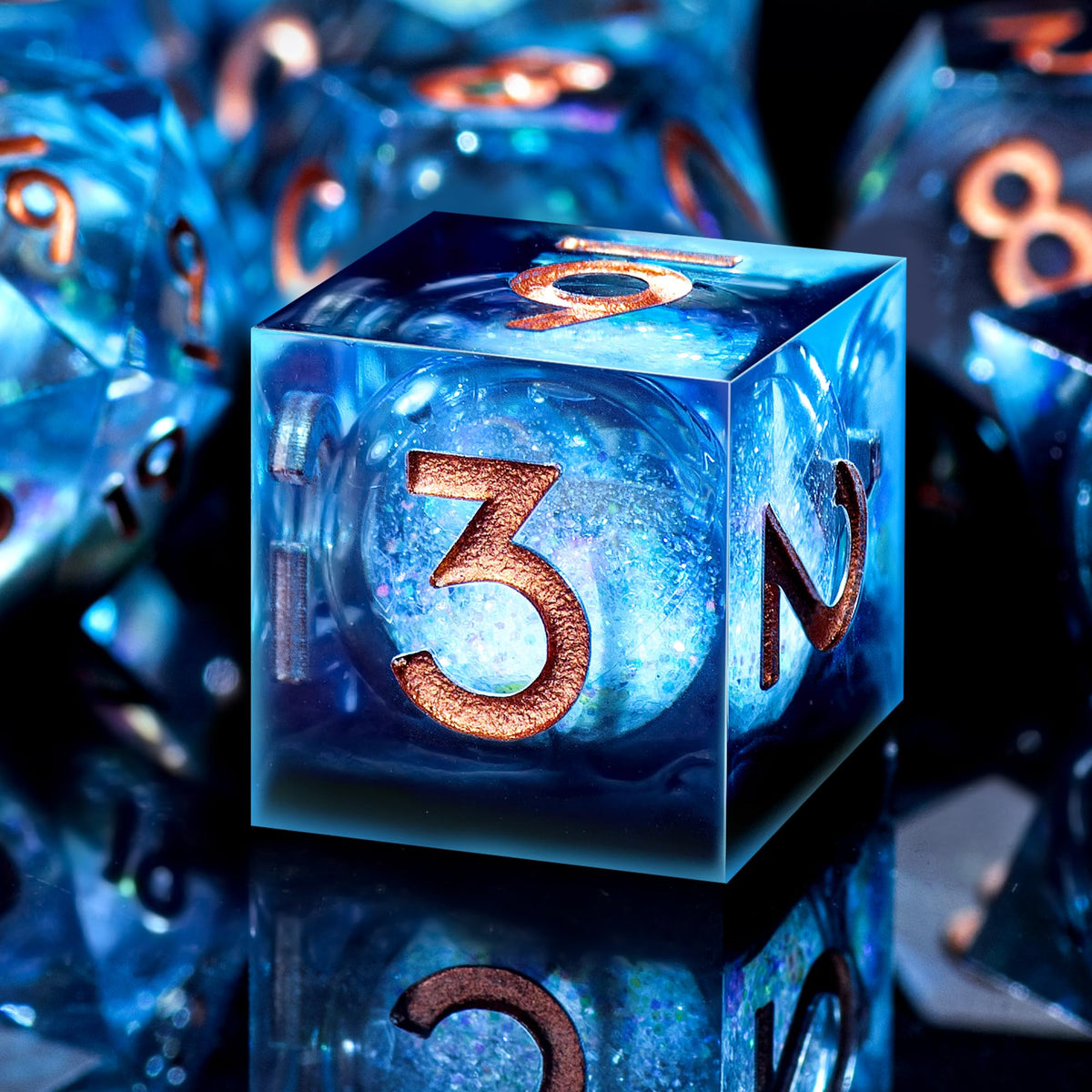 AUSTOR liquid core DND dice set in display box showing vibrant quicksand visuals