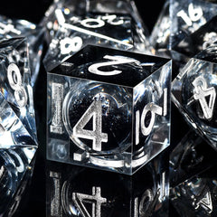 AUSTOR liquid core DND dice set shown in the metal display box