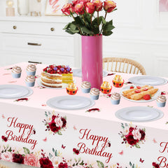 Delicate floral print provides a refined backdrop for birthday celebrations.