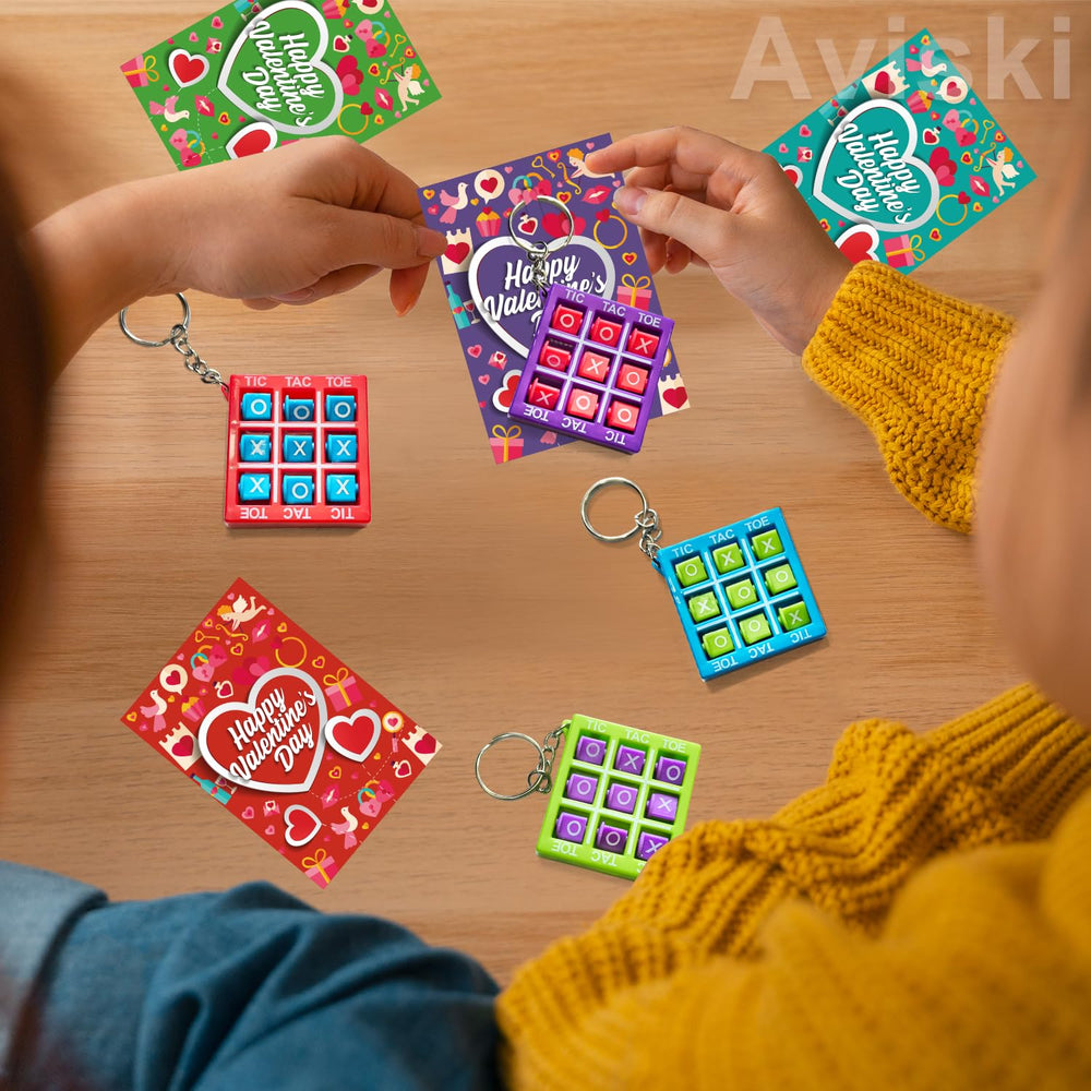 Aviski card and keychain duo decorates bags or desks.