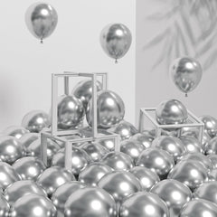 Awenztech 120pcs metallic silver balloons pack for elegant party decor and arches.