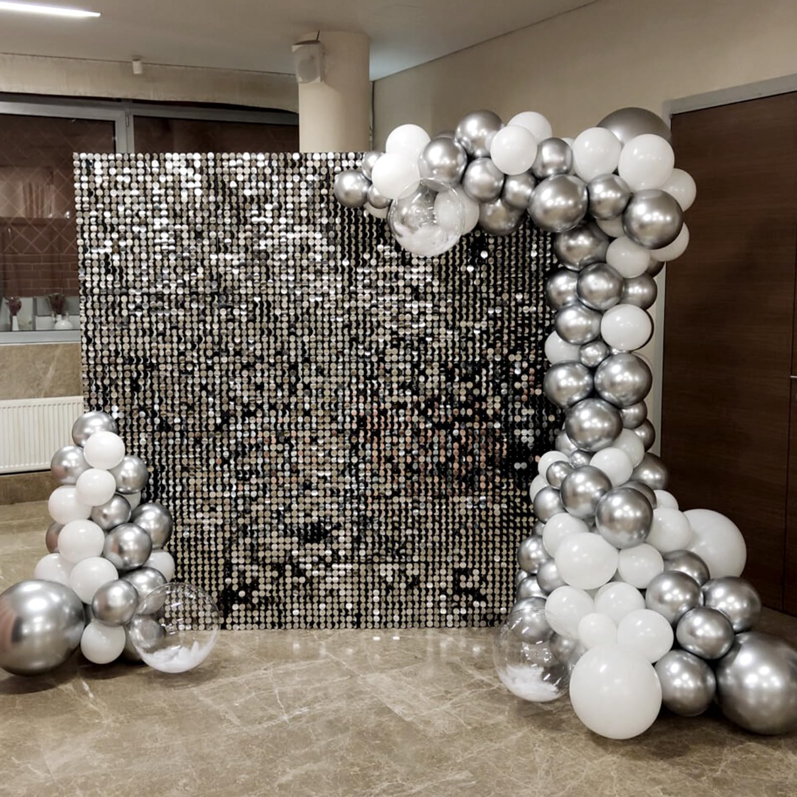 Awenztech 33ft silver ribbon roll with balloons for cohesive decor.