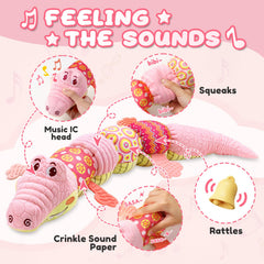 AWOTOY crocodile musical toy pink crinkle detail enhances auditory curiosity.