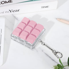 Axlksia keyboard fidget toy on a desk for everyday focus use