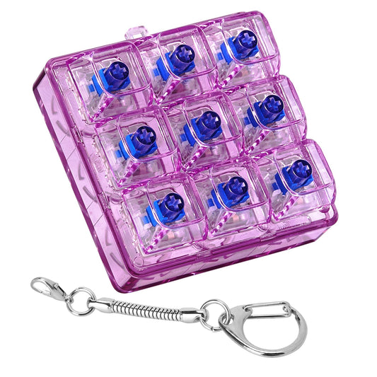 Axlksia keyboard fidget keychain press closeup for stress relief.
