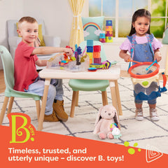 B. toys Alpha B. Tical in action: tiny hands place letters on the board.