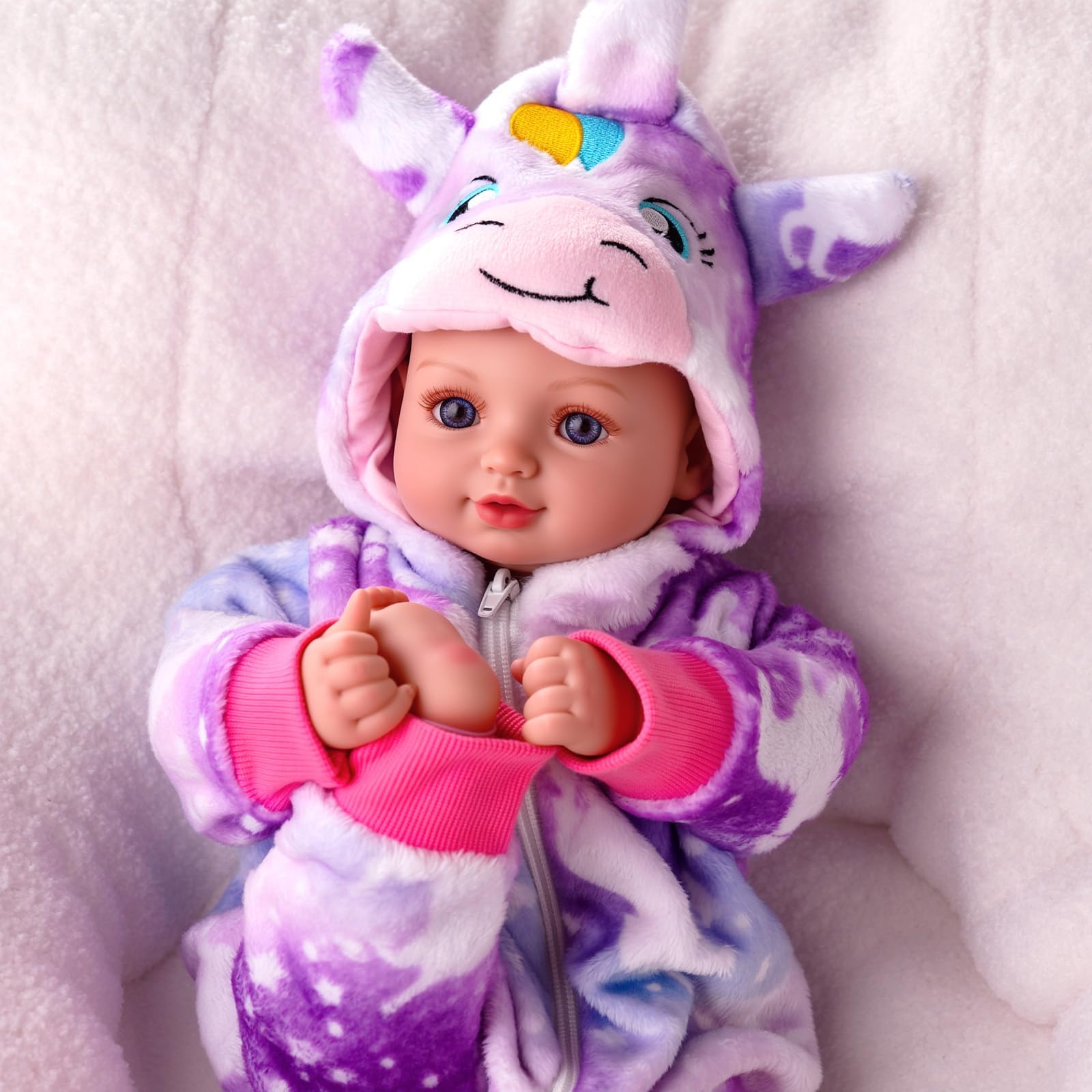 BABESIDE hand-rooted lashes add lifelike eye detail for pretend play.