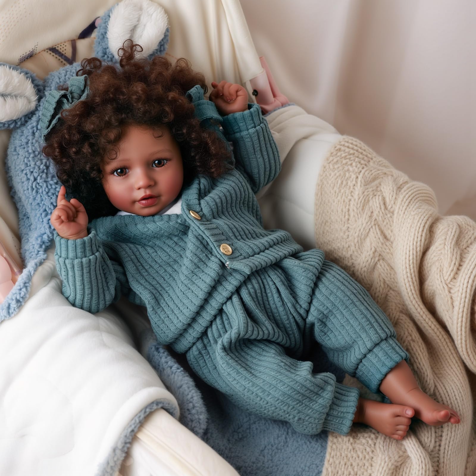 Babeside doll dressed in clothes with a toy gift included