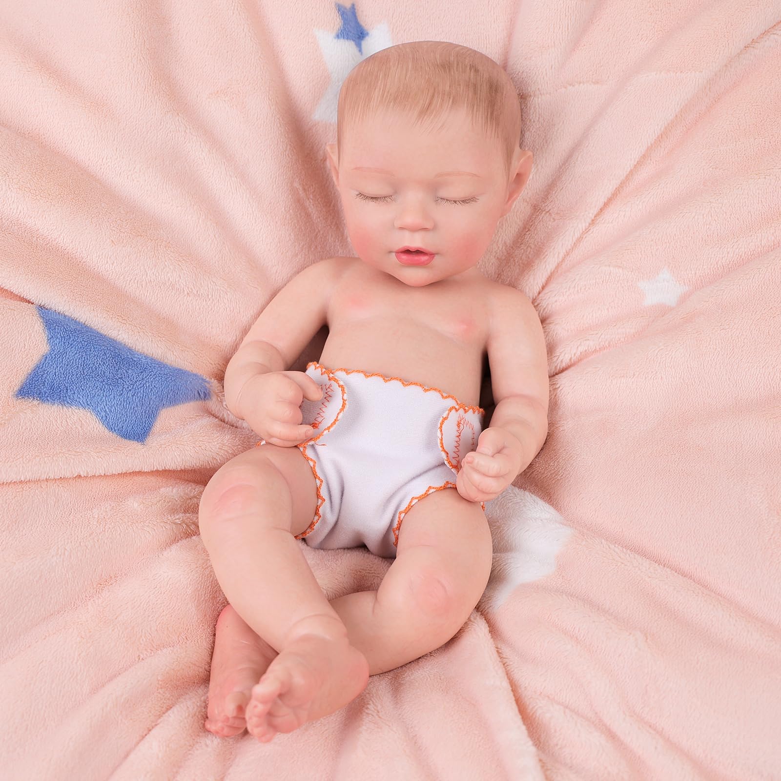 Close-up of BABESIDE doll diapers showing soft, durable fabric for repeated play