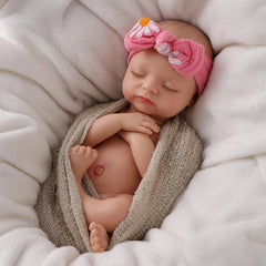 Babeside doll includes preemie clothes and accessories for imaginative styling and caring play.