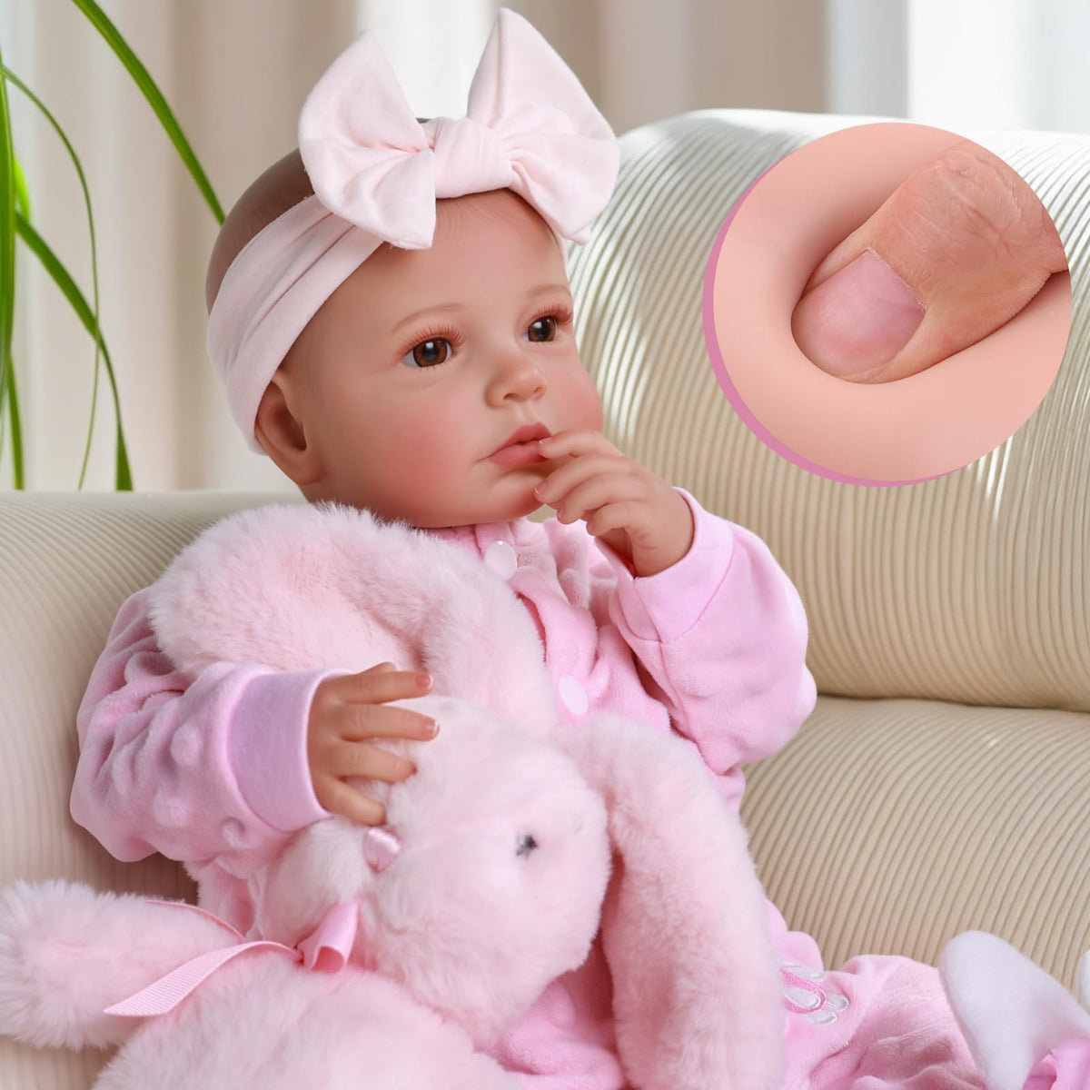 BABESIDE Reborn Doll face close-up showing lifelike eyes and rooted lashes for realistic play