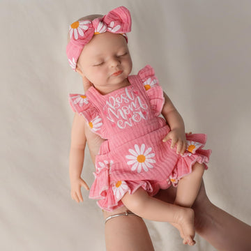 Babeside silicone baby doll warm expression invites gentle nurturing and imaginative play.