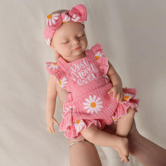 Babeside silicone baby doll warm expression invites gentle nurturing and imaginative play.