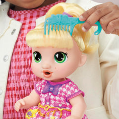 Baby Alive hairbrush helps style LaLa GooGoo’s hair.