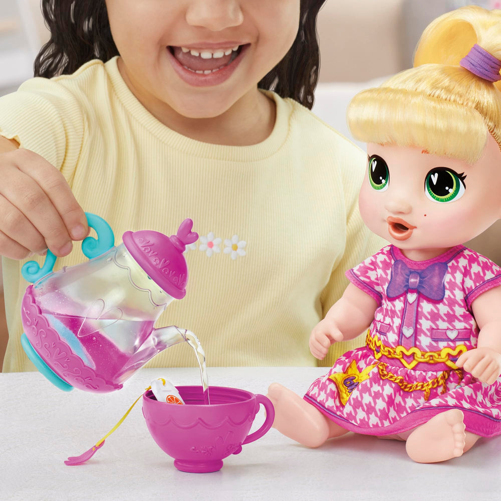 Baby Alive teabag in water enhances imaginative tea prep.