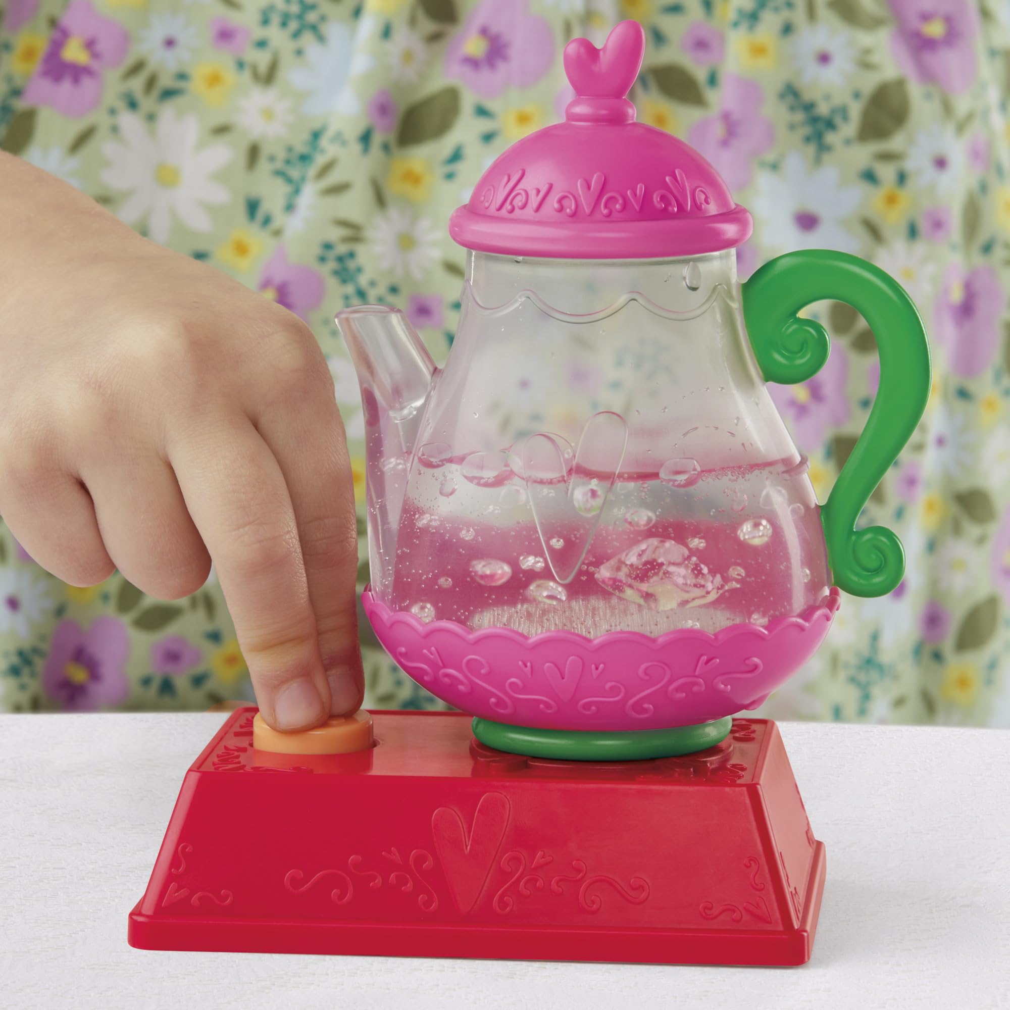 Baby Alive bubbly-tea-pot bubbling for pretend tea time.