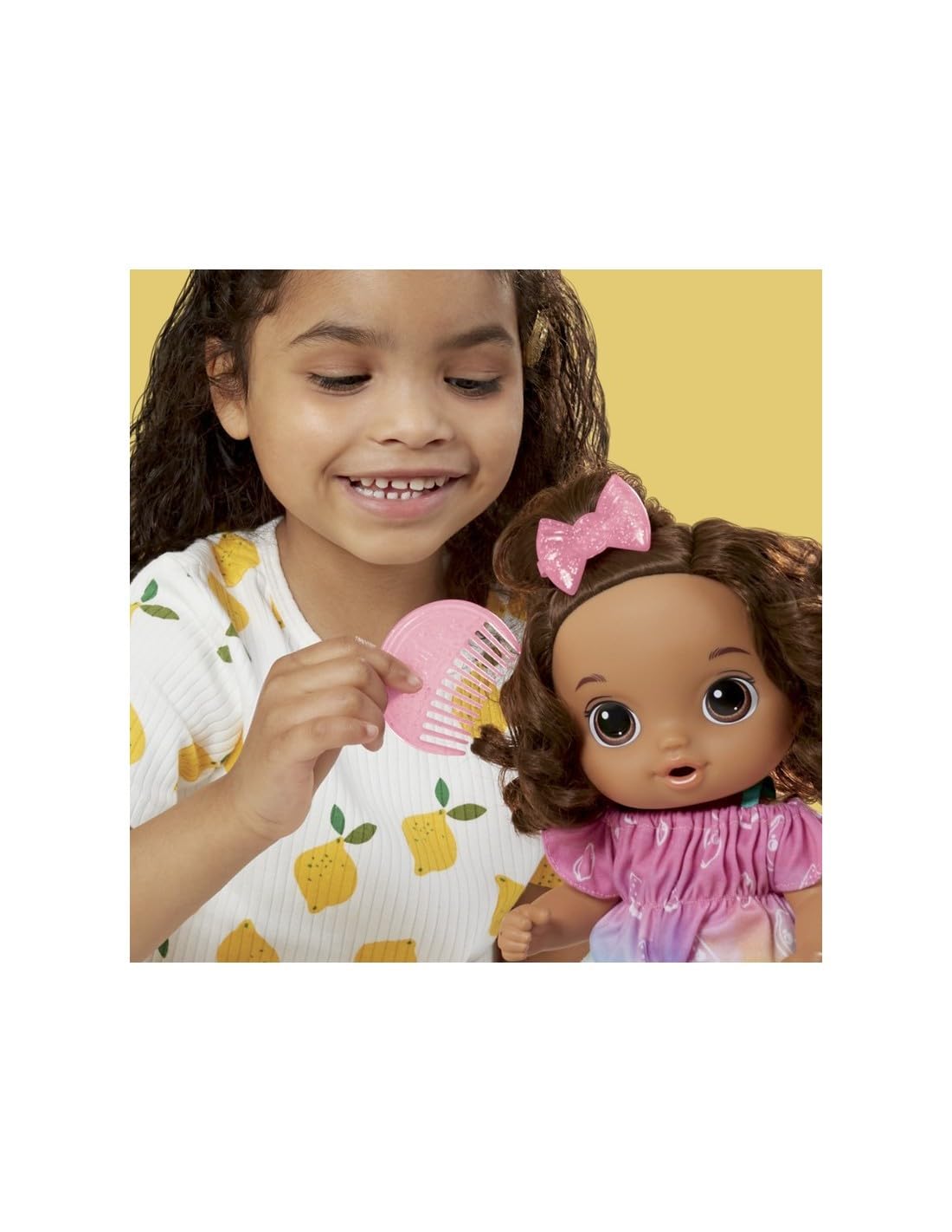 Rainbow fruit-design outfit on Baby Alive Fruity Sips doll for dress-up fun.