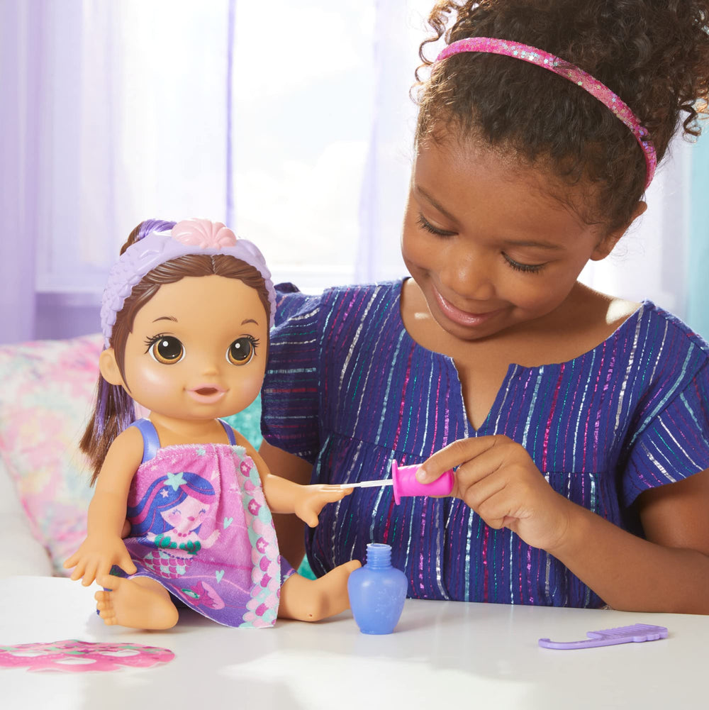 Baby Alive Glam Spa Purple Streak Ponytail for easy styling.