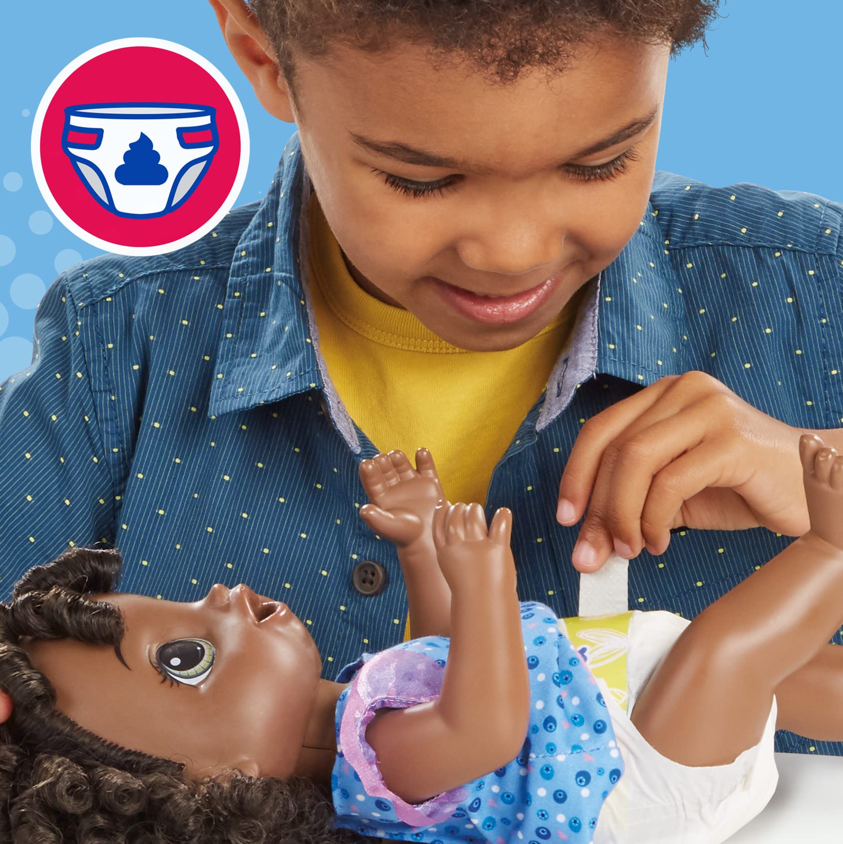 Removable dress and comb from Baby Alive for dress-up grooming play.