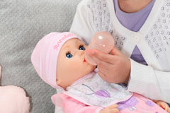 Baby Annabell Active Annabell doll with bottle supporting feeding time play.