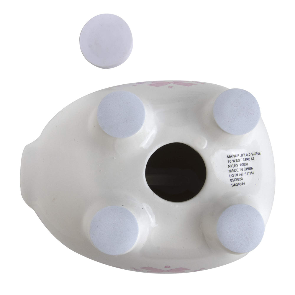 Baby Essentials My First Piggy Bank pink nursery decor on a dresser