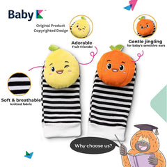 BABY K Pear rattle encourages reaching and shaking for skill practice.
