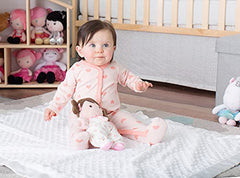 Olivia doll with rattle adds gentle entertainment for baby play.