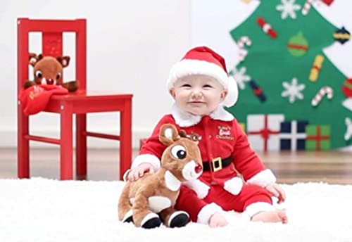 Rudolph plush pressing the button to play a classic song.