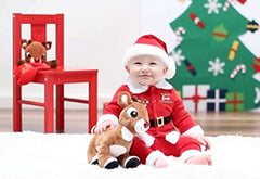 Rudolph plush pressing the button to play a classic song.