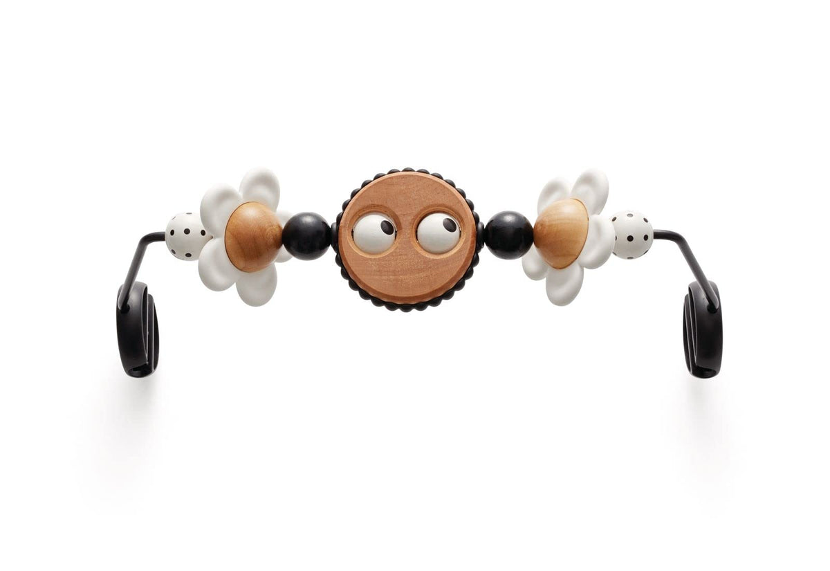 BabyBjörn Googly Eyes Toy on the bouncer with high-contrast visuals.