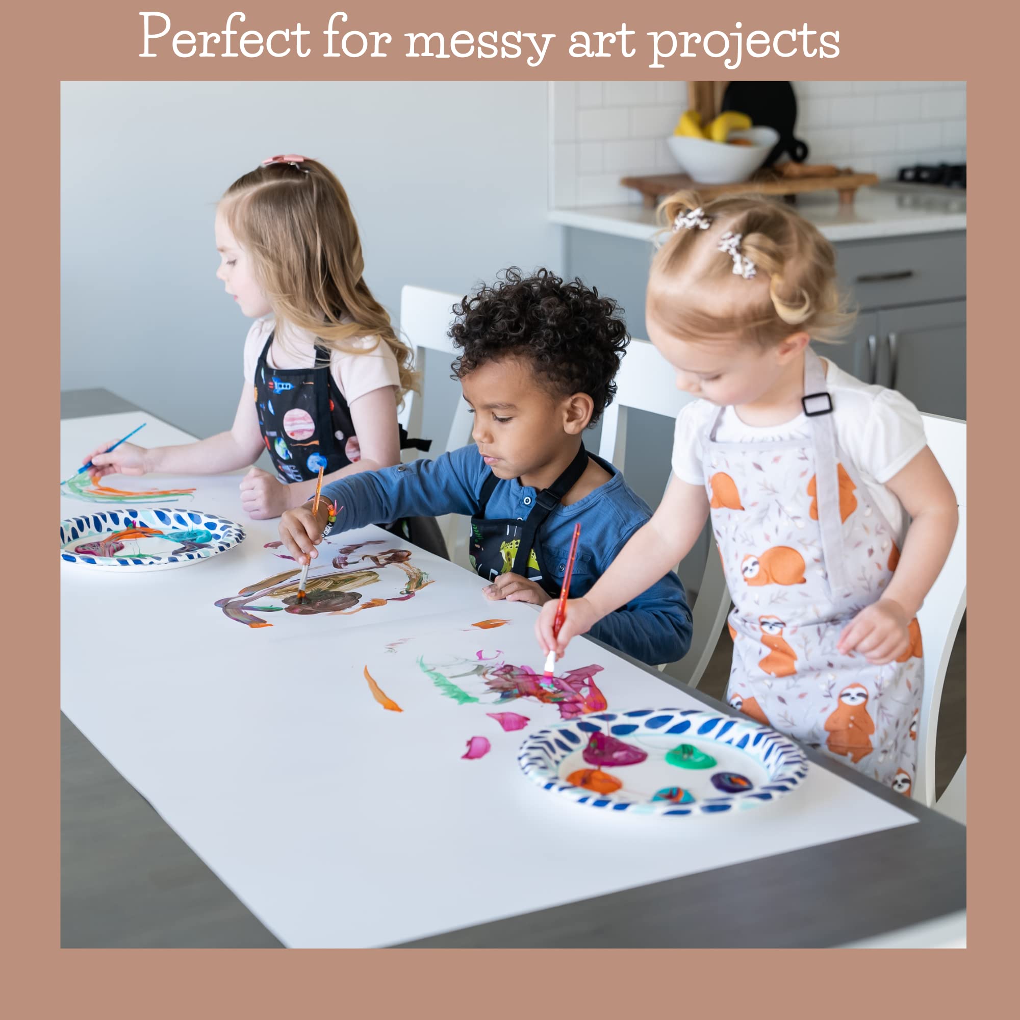 BABYBOET cosmic apron painting setup highlights vibrant colors and mess control