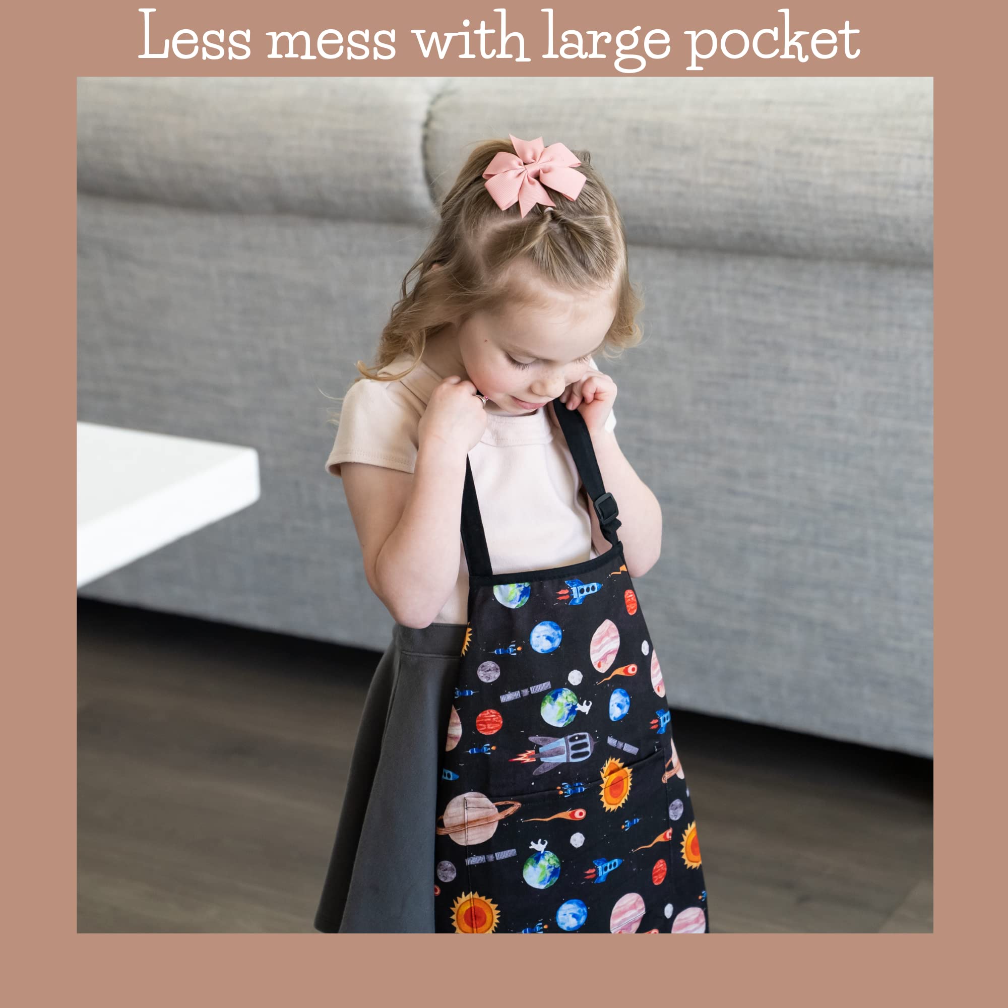 BABYBOET Cosmic Collection apron pocket in use with brushes during crafts
