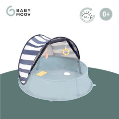 Aquani built-in mosquito net shields from sand and bugs.