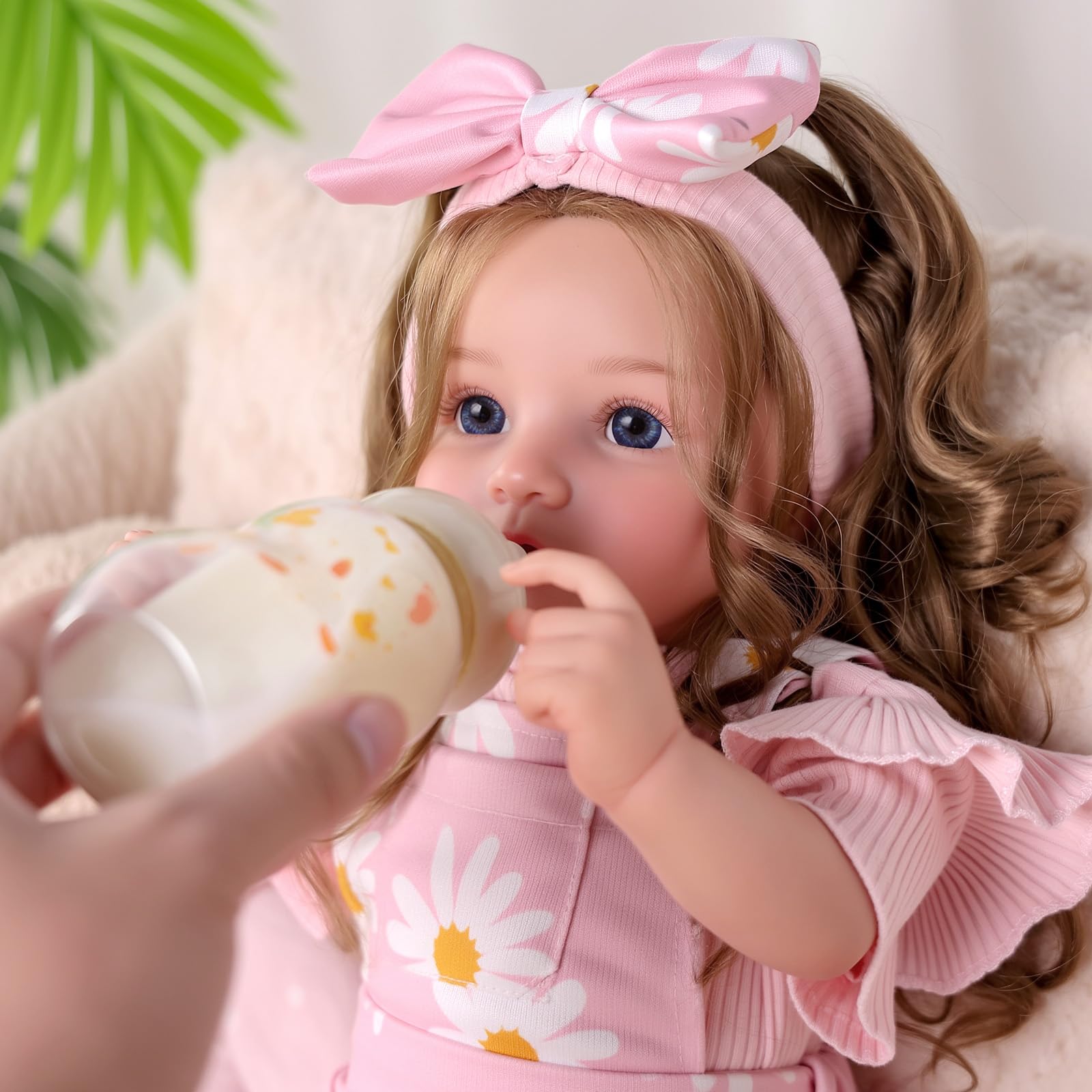 BABESIDE Reborn doll holding pose is ideal for bedtime snuggles
