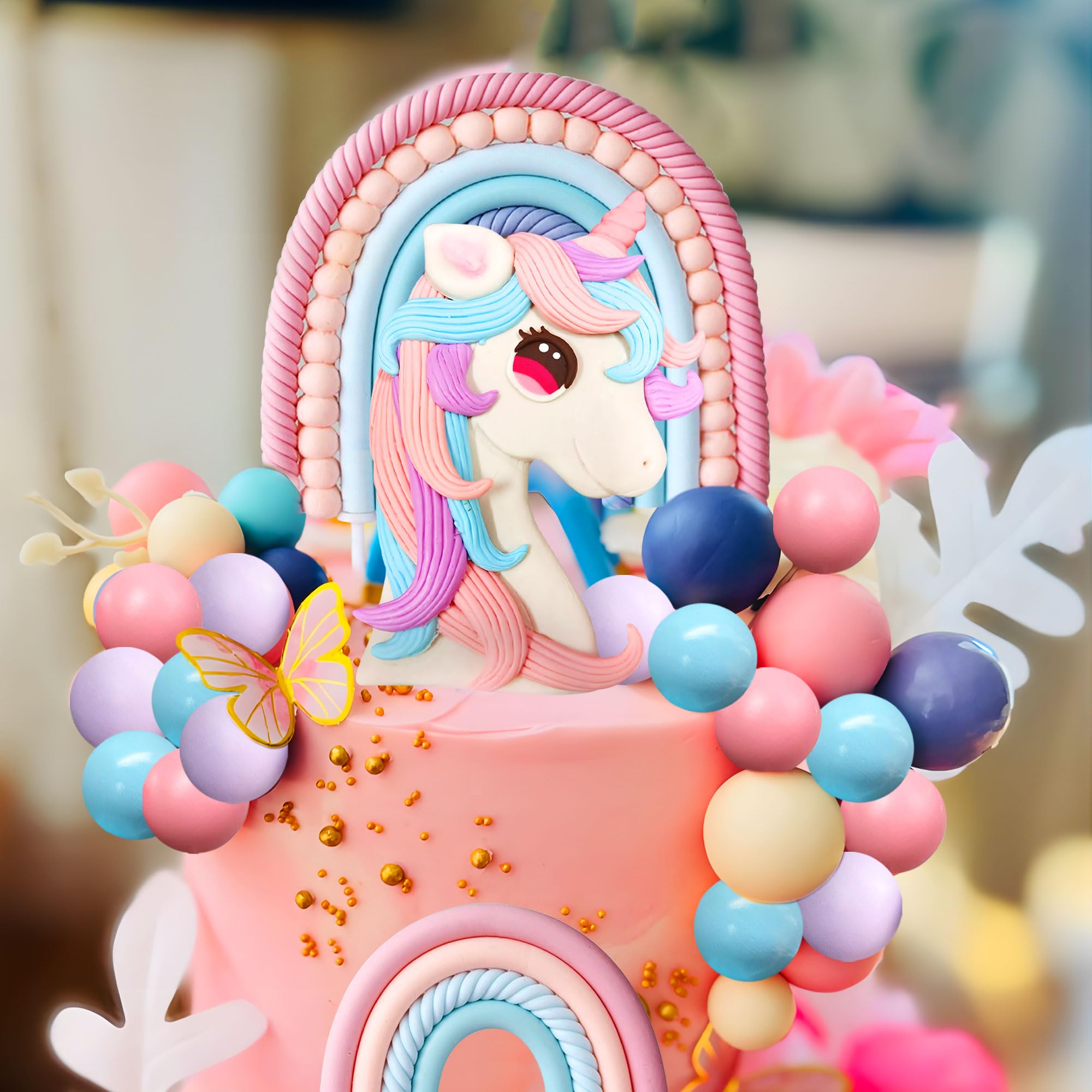 Blue balls create cool contrast against pastel cake backgrounds