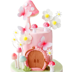 Bach and Boujee fairy cottage cake topper enhances fairy-tale visuals.