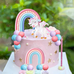 Bach and Boozy rainbow cake topper brightens desserts for unicorn party vibes