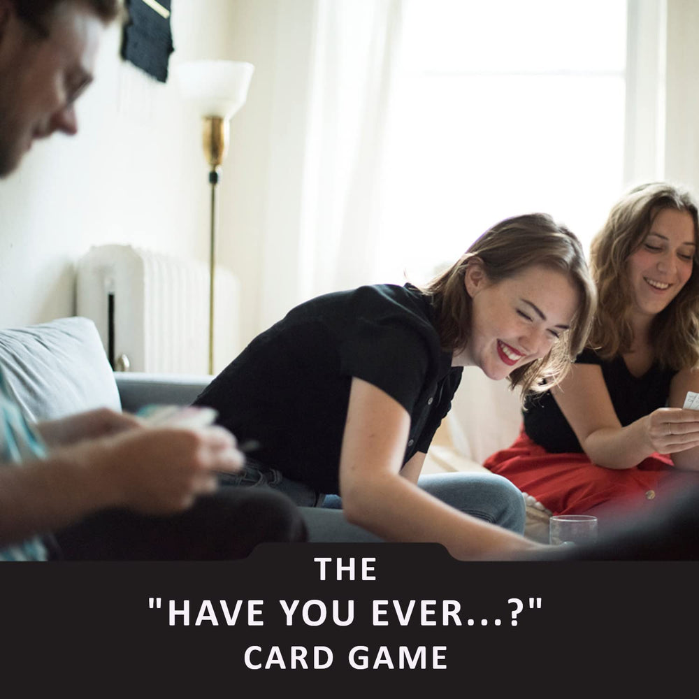 Bad Choices After Dark players laughing while enjoying outrageous questions.
