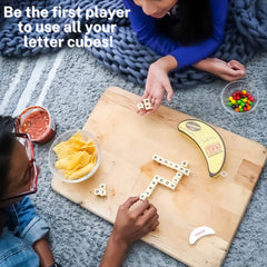 Bananagrams Duel banana-themed cards add playful challenges during rounds.