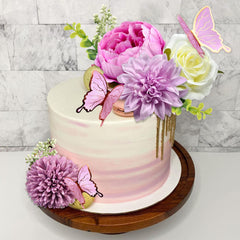 BANBALLON pink butterfly cake decoration enhances whimsy on desserts.