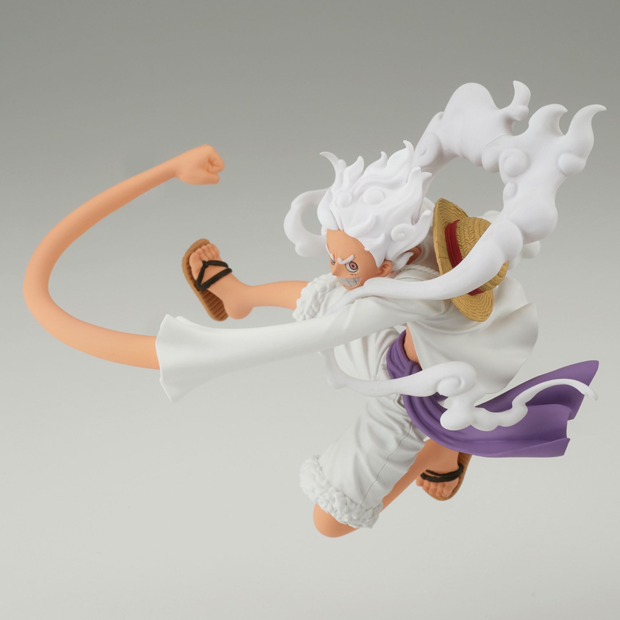 Banpresto One Piece Gear 5 Luffy figure side view enhances shelf display.