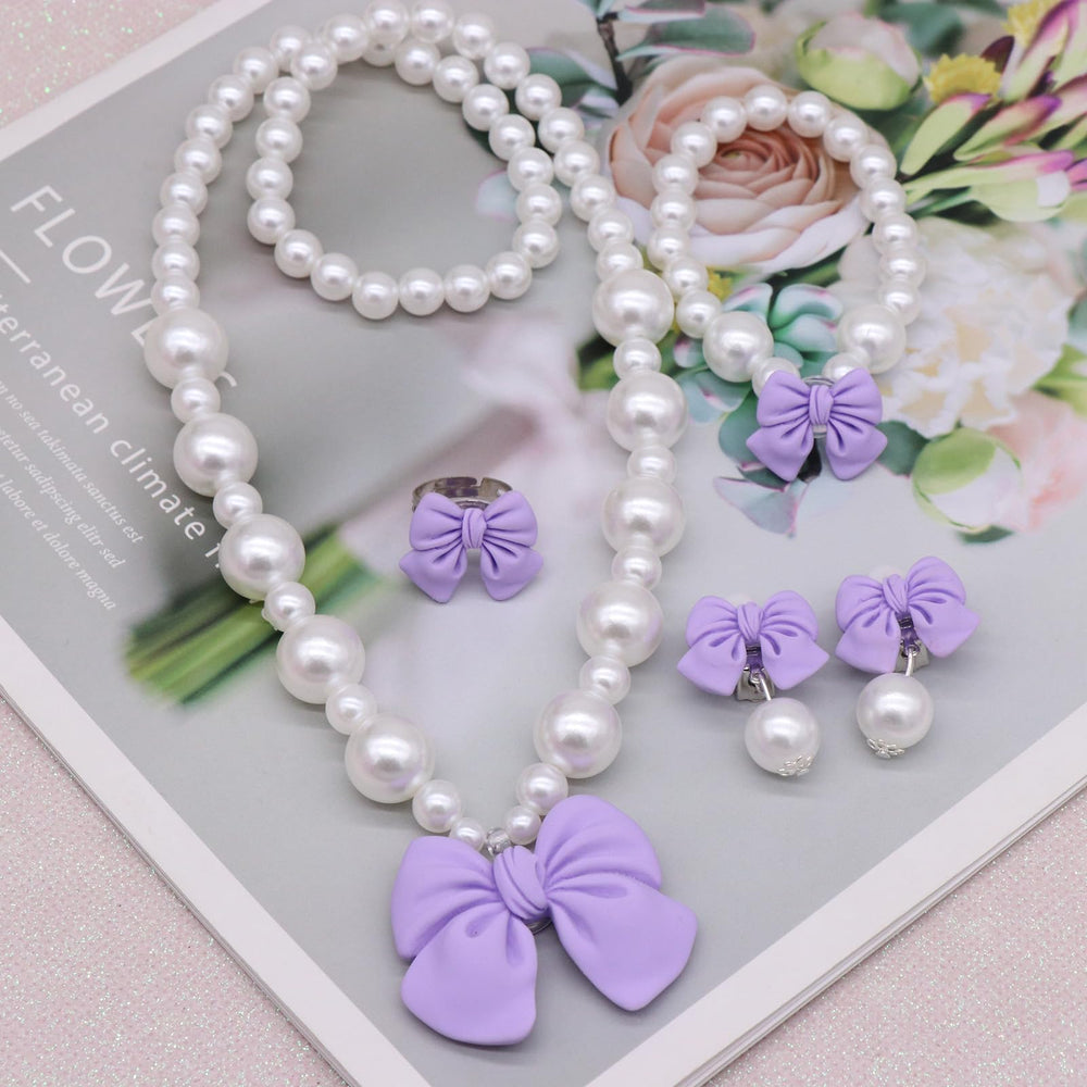 BAOBAOJOY purple bow ring adds glitter to pretend princess looks.