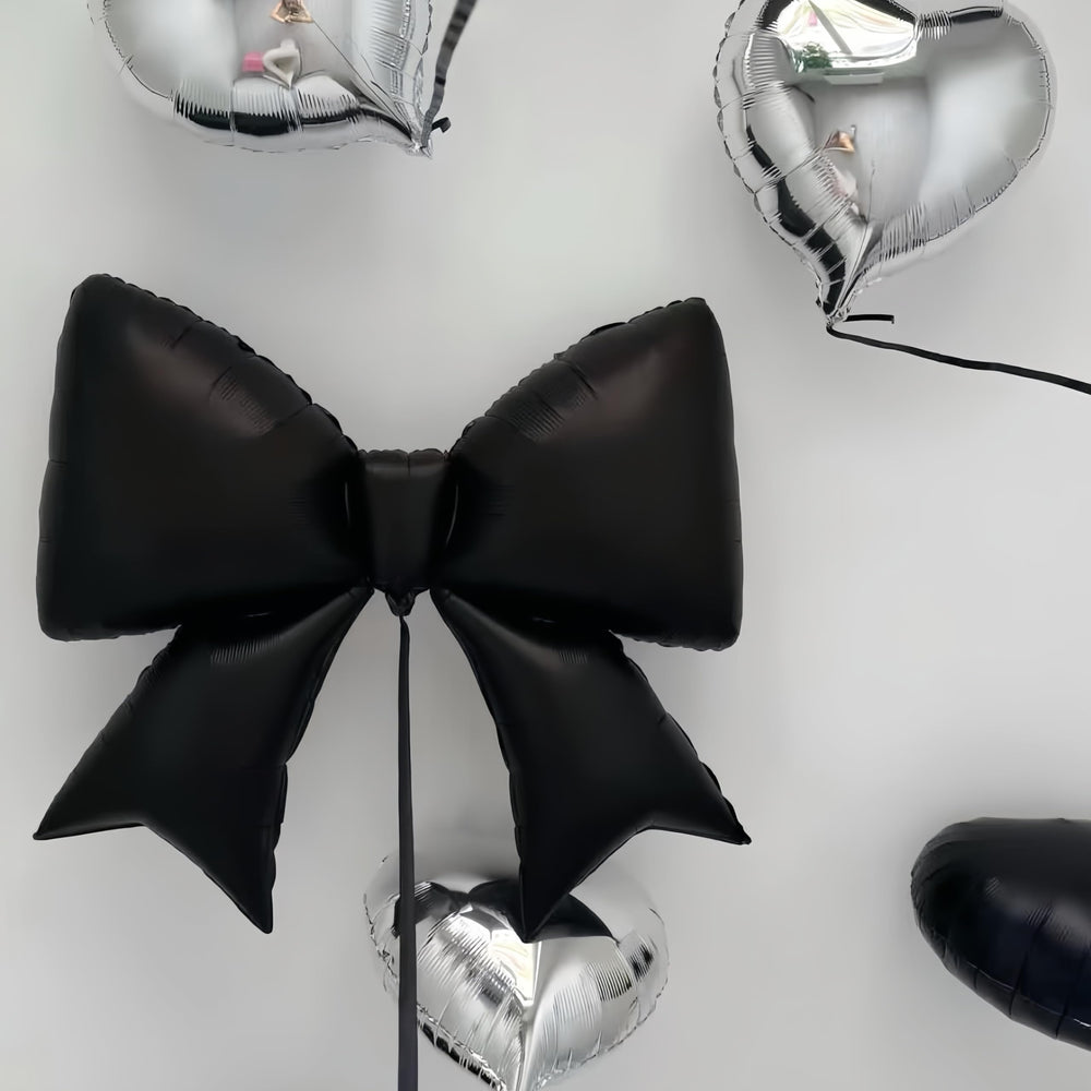 Baoonworlld 38-inch black bow balloon creates a striking focal point for weddings and parties.