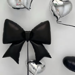 Baoonworlld 38-inch black bow balloon creates a striking focal point for weddings and parties.