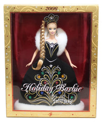 Barbie 2006 Holiday Doll by Bob Mackie in black gown with white faux fur, ideal for festive display.