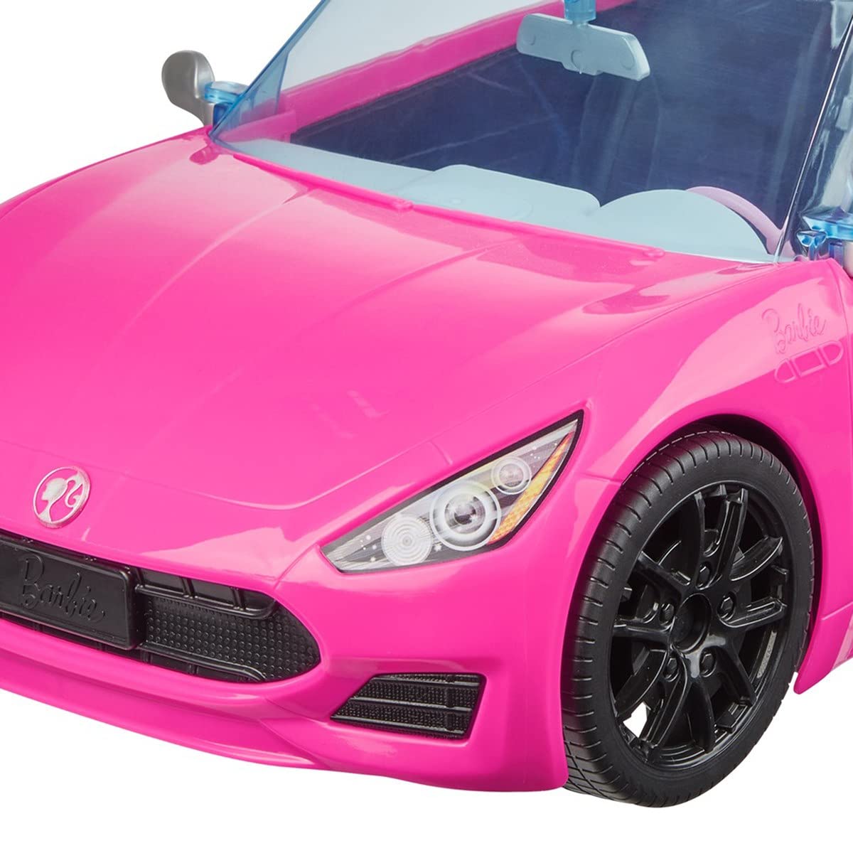 Barbie Ave Convertible Brunette side view supports pretend driving adventures.