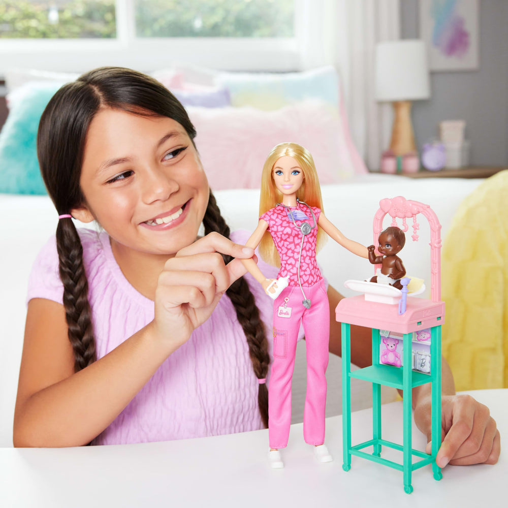 Barbie Baby Doctor examination table with stars overhead for imaginative care scenes